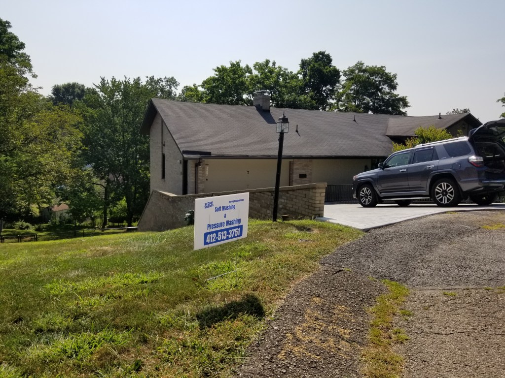 A Pittsburgh-area home that has just received a roof wash from So Clean Solutions.