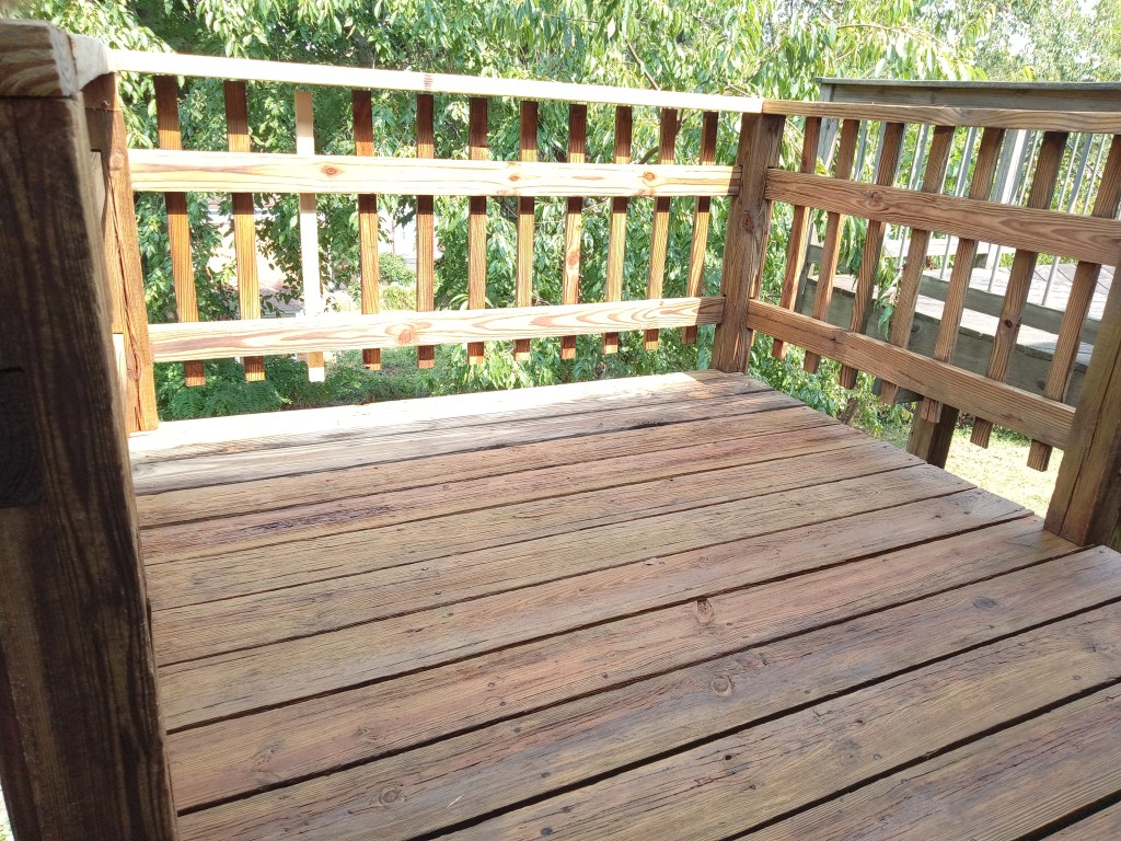 A wood deck at a Pittsburgh-area home after professional cleaning by So Clean Solutions.